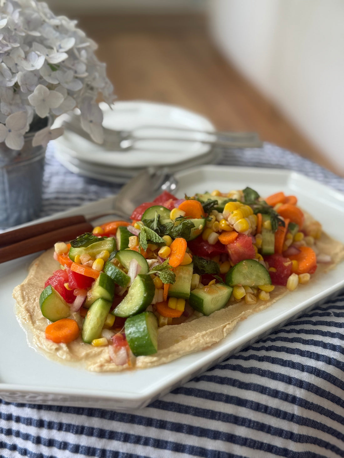 Rainbow Salad Over Hummus